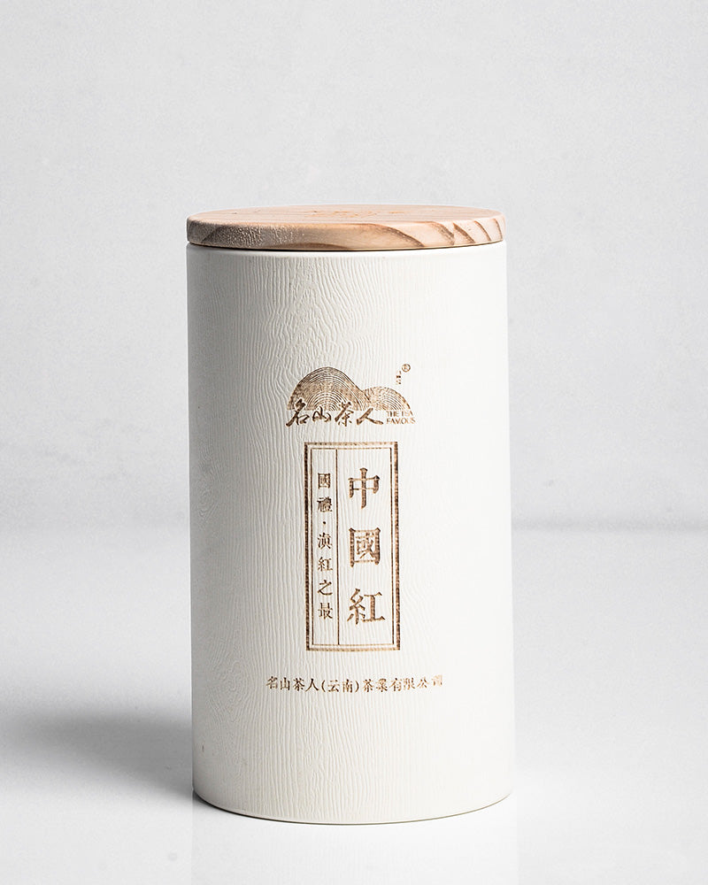 A white canister with Zen Tea Master Chinese Black Tea 130g written in Chinese on it.