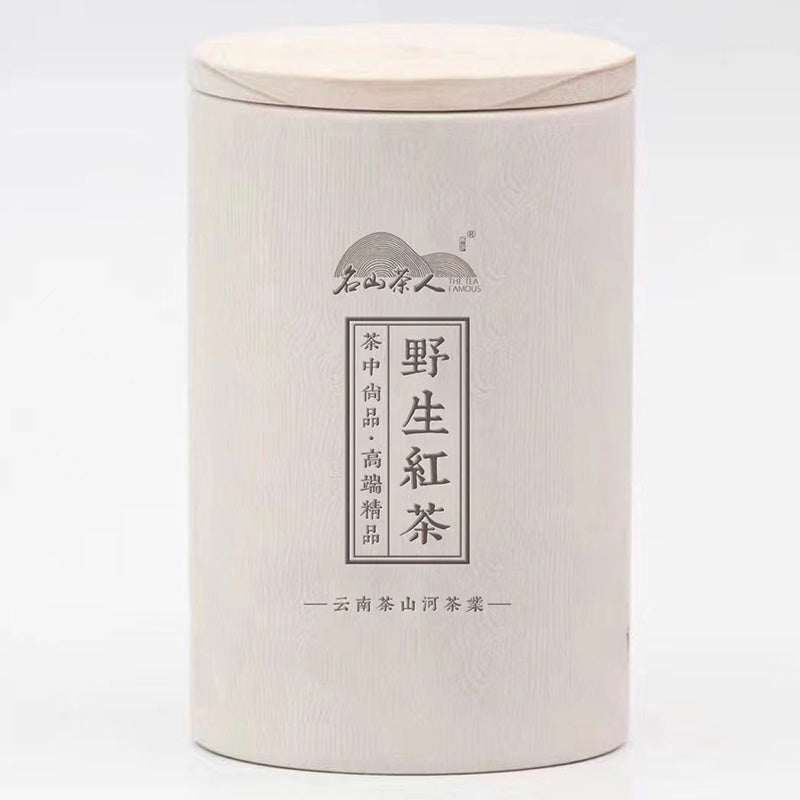 White cylindrical container with Chinese characters on the front, featuring a wooden lid. The container likely holds Zen Tea Master's Wild Red Tea 100g.