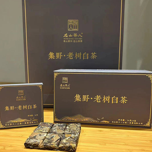 A box of Jigeno White Tea 400g/50g by Zen Tea Master, with Chinese writing on it, known for its health and wellness benefits and exceptional medicinal value.