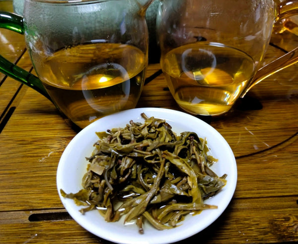Image 4: The liquor of a pu-erh dragon pearl